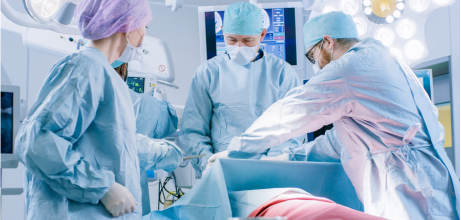 surgeons performing invasine surgery
